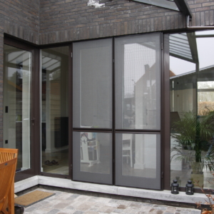Dubbele deur en enkele deur in Reynaers aluminium