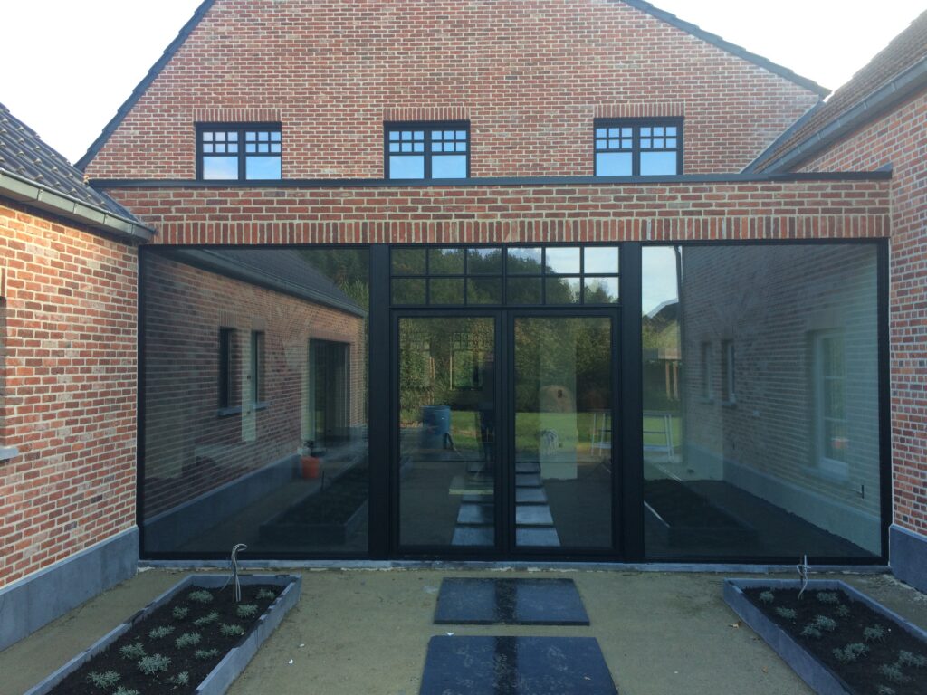 Vaste ramen en dubbele draaikiep ramen in Reynaers aluminium (SL 38)